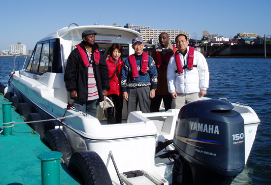 Crew photo: Barry Okori(me), Mr.& Mrs. Arakawa, Felix Missiala, Katsuhiko Egusa(our captain/pilot)
