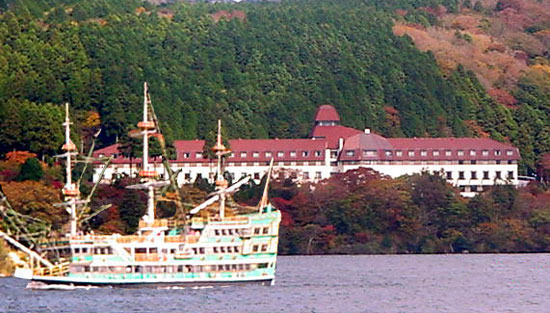 Vasa the Lion of North Europe a replica sea pirate ship or kaizokusen cruises past the Yama Hotel on lake Ashi